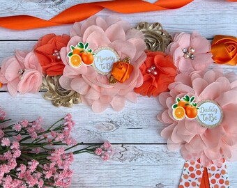 Oranje zwangerschapssjerp voor babyshower, mama- en papaspelden