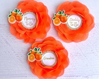 Oranje babyshowerspelden: Little Cutie Family-corsage