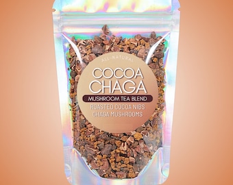 May include: A clear, holographic pouch filled with a brown mixture of roasted cocoa nibs and chaga mushrooms. The pouch has a circular label with the words "COCOA CHAGA" and "MUSHROOM TEA BLEND". The words "ALL-NATURAL" are above the label.
