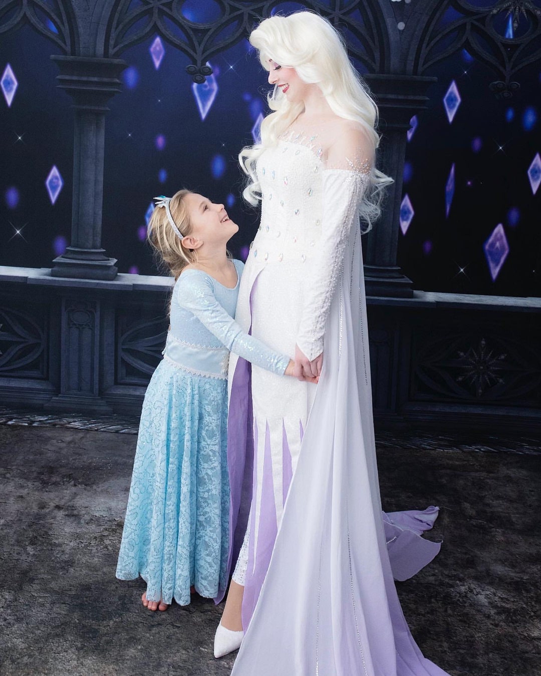 Download Welcome the royal Elsa wearing her iconic striking white gown from Frozen  2 Wallpaper | Wallpapers.com