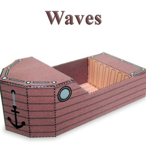 May include: A brown paper model of a boat with a white anchor and a blue porthole. The model is labeled "Waves".