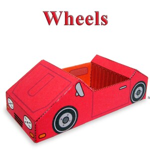May include: A red paper car model with wheels, a windshield, and headlights. The car is labeled "Wheels".