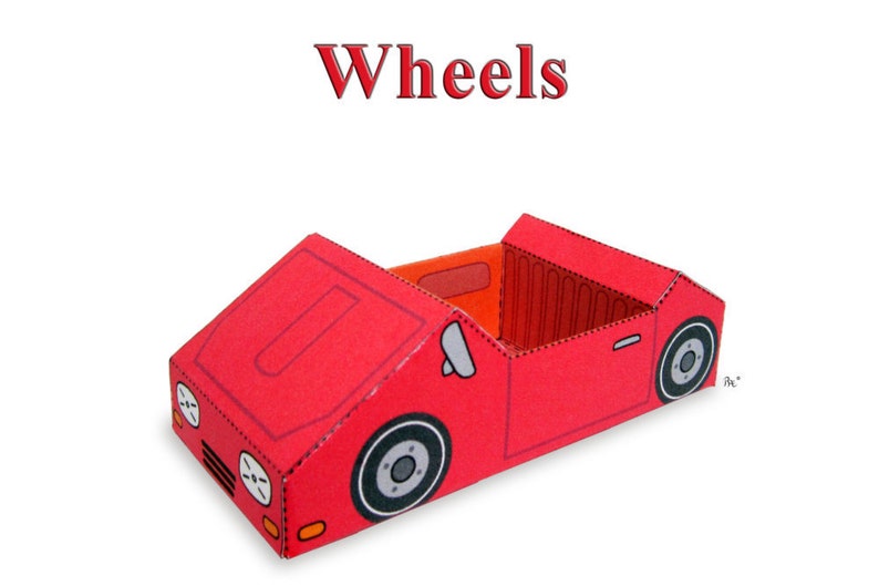 May include: A red paper car model with wheels, a windshield, and headlights. The car is labeled "Wheels".