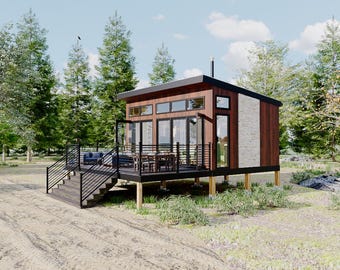 May include: A small, modern cabin with a wooden exterior and a stone accent wall. The cabin has large windows and a deck with a railing. The cabin is surrounded by trees.