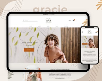 May include: A website homepage for a children's clothing store called "gracie". The website features a photo of a child wearing a brown long-sleeved shirt and a wooden background with green vines. The website also features a shop button and the text "Lorem ipsum dolor sit amet".