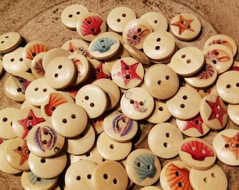 5Wooden buttons with funny fish motifs