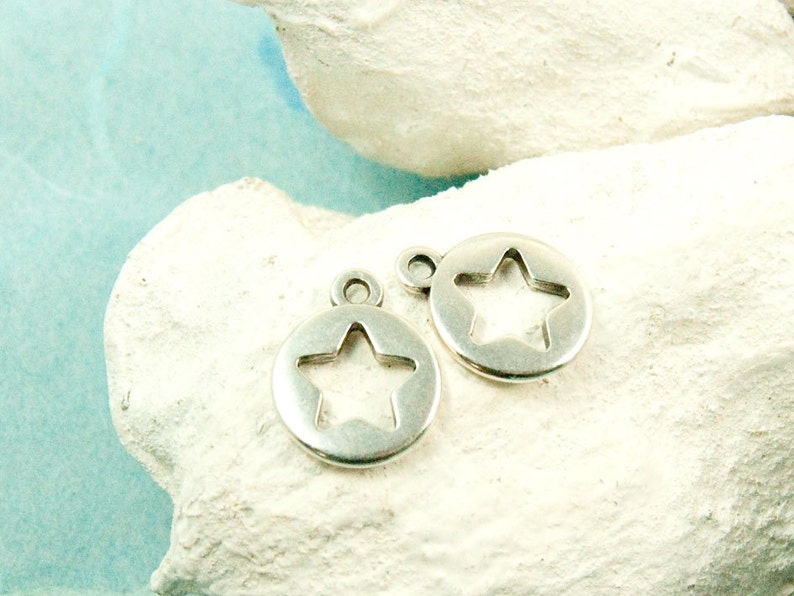 2x star pendant around 10 mm antique silver plated #3599