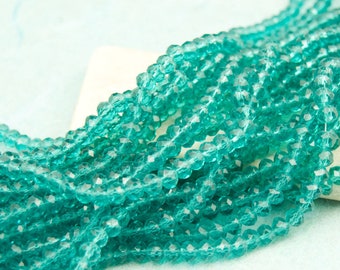 approx. 140 pieces glass beads 4 x 3 mm faceted rondelle, cyan, 005750