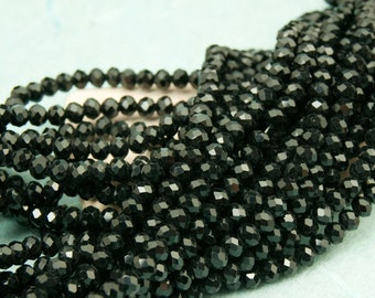 Approx. 140 glass beads 4 x 3 mm faceted rondelle, black
