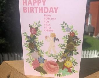 Greeting card: happy birthday cherub.