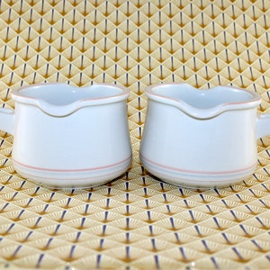 Bing and Grøndahl - SIESTA - 2 Lovely stoneware saucer with handle  - Designed by Jens Quistgaard  - Made in Denmark 1960.