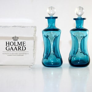 Holmegaard  - 2 Lovely vintage glass bottle in turquoise color  - Designed by Jacob bang - Made in Denmark 1960.