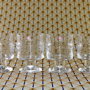 Iittala  - 4 Akvavit glasses - From the serie DROPPRING  - Designed by Timo Sarpaneva - Made in Finland 1970.