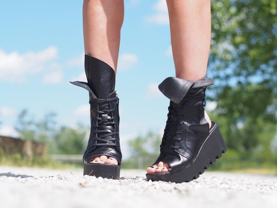 Women's crissy laser outlet cut heeled ankle booties