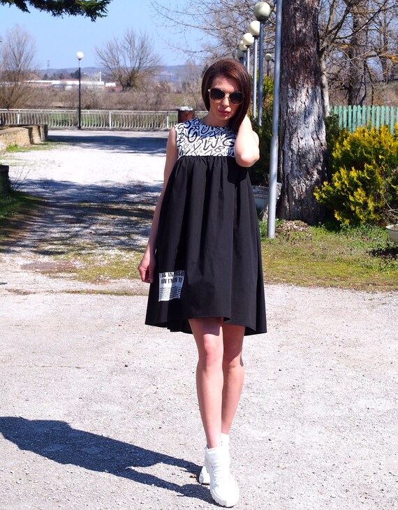 Tenue robe noire sale