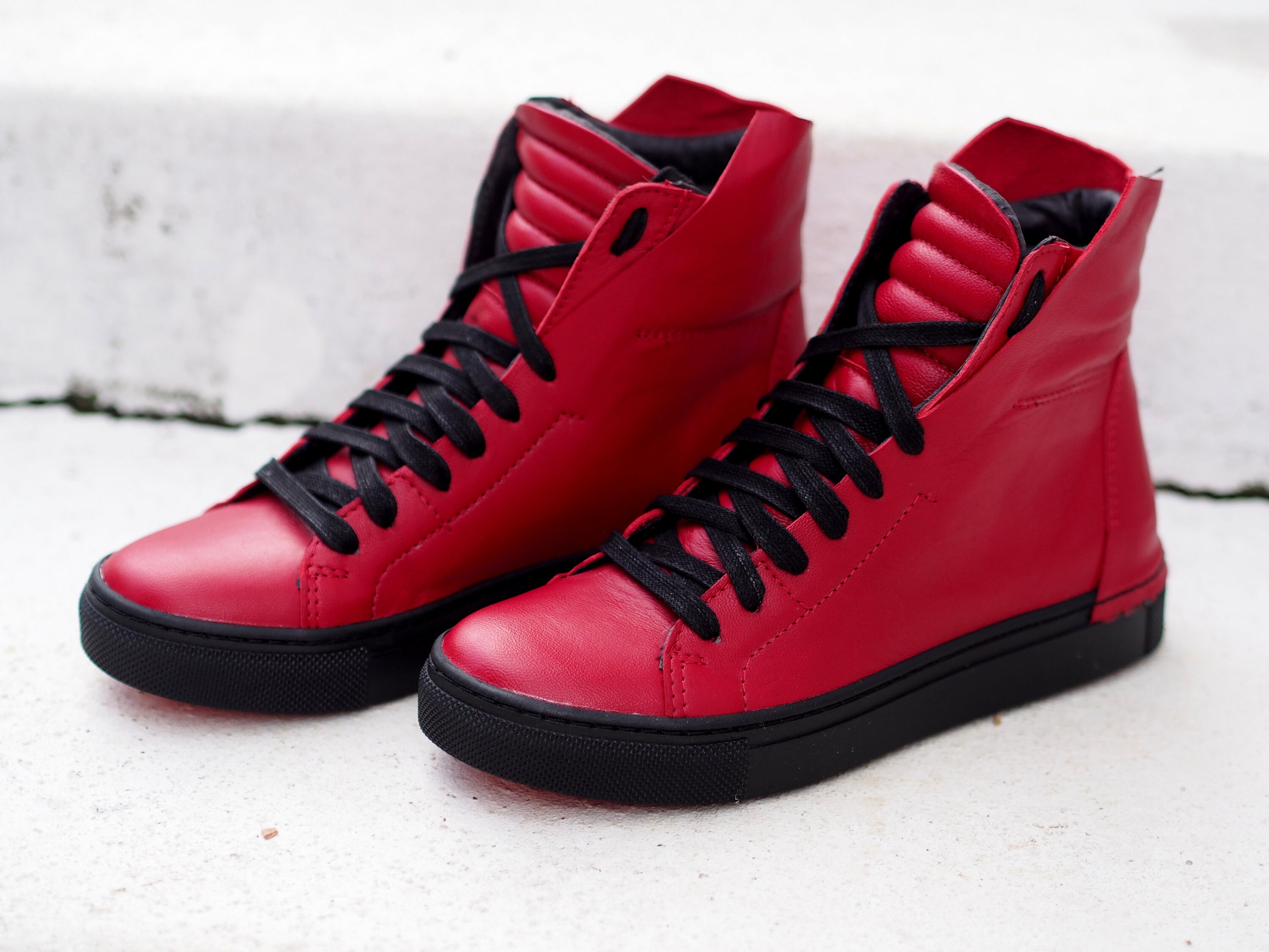 Red leather shop sneakers ladies