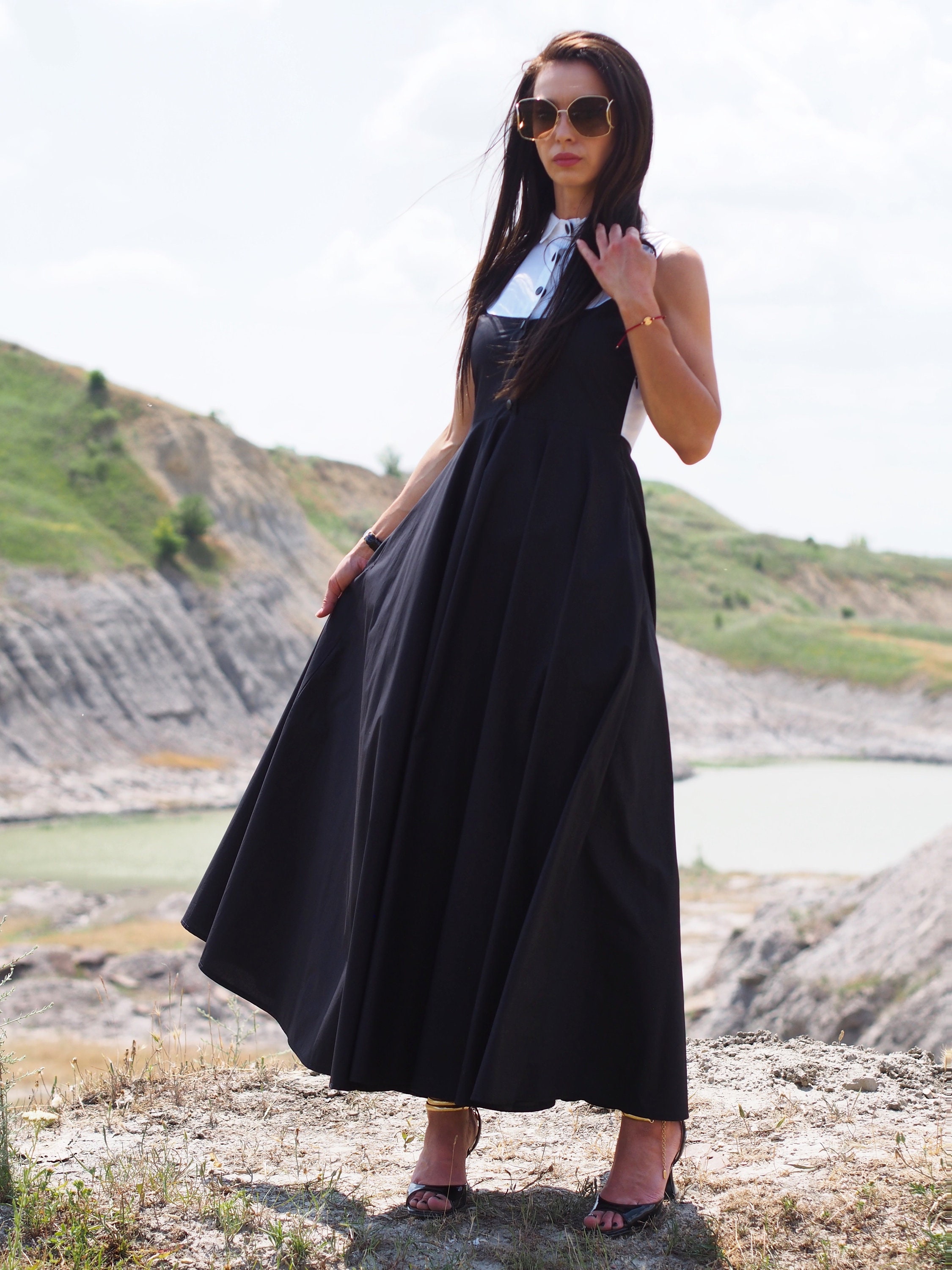 Black Sleeveless Vintage A-Line Maxi Dress with White Collar - Elegant Gothic Inspired Summer Dress with Buttons Black Sleeveless Vintage A-Line Maxi Dress with White Collar - Elegant Gothic Inspired Summer Dress with Buttons