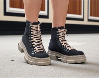 Bottines épaisses noires à lacets en cuir véritable avec semelle beige