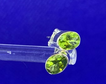Peridot stud earrings facet cut set in sterling silver
