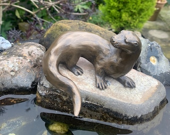 Otter figurine cold cast bronze looking back fine quality