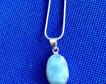 Aquamarine faceted drop set in  sterling silver Natural raw gem 45cm snake chain.