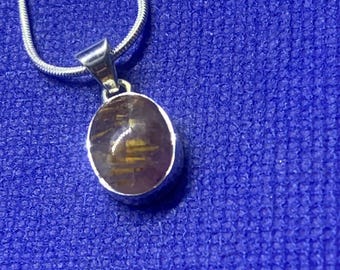 Super 7 drop pendant small and snake chain Natural stones/crystals set in sterling silver.