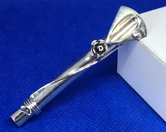 A sterling silver victorian style posy holder/ button hole holder for rose/spray