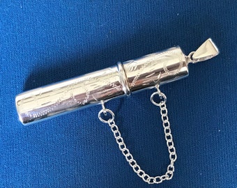 Needle case /toothpick holder sterling silver .Victorian in style, etched on one side connecting chain