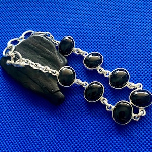 Whitby Jet Bracelet  set in  sterling silver Natural polished stones Whitby Yorkshire U.K Local to us.