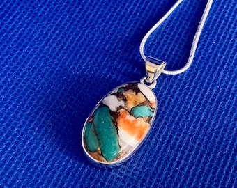 Spiny Oyster and turquoise pendant medium sterling silver and snake chain Natural stones set in sterling silver.