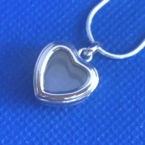 Locket heart for babies first curl mini rhodium plate on sterling silver plus silver snake chain or for a missed bereaved love one