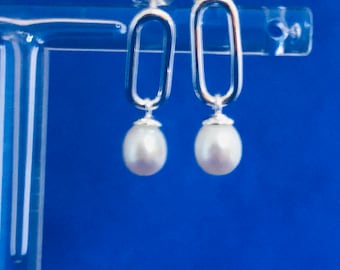 Pearl drops set on sterling silver earrings