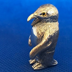 A Miniature Sterling silver Penguin Figure.