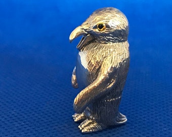A Miniature Sterling silver Penguin Figure.