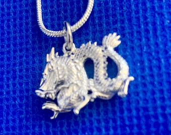 Dragon pendant Sterling Silver fabulous great quality.includes silver snake chain 46cms Got fans