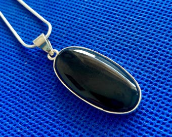 Whitby Jet pendant medium set in  sterling silver Natural polished stones *10 Whitby Yorkshire plus silver snake chain U.K Local to us.