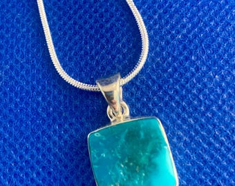 Turquoise Pendant Natural stones set in sterling silver. Sleeping beauty mine. Now retired. Arizona.