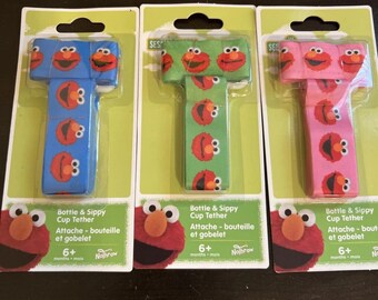 Rare 12 Set Nothrow No Throw Sesame Street Bottle Holder Elmo, green-pink-blue