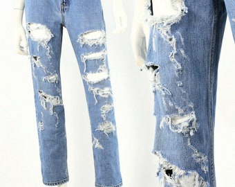 levis 560 light stonewash jeans
