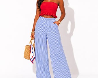 Pantalones anchos a rayas estilo años 70 para mujer, color azul y blanco, de talle alto y corte acampanado, de tejido seersucker.