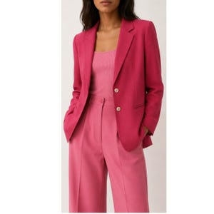 May include: A vibrant fuchsia blazer with two button closures, paired with a matching pink top and high-waisted pants. The outfit is a monochromatic ensemble, showcasing a tailored, professional look. The blazer has a classic lapel and the pants have a wide leg.