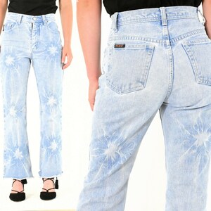 90s vintage womens 00p light wash tie dyed high waist flare leg raw hem jeans Revolt