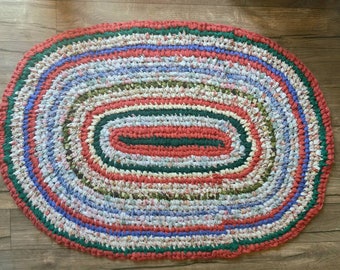 Coral, blue, yellows, green Rag Rug, large oval. Toothbrush knotted rag rug. Machine wash and dry. Machine Wash Dry!