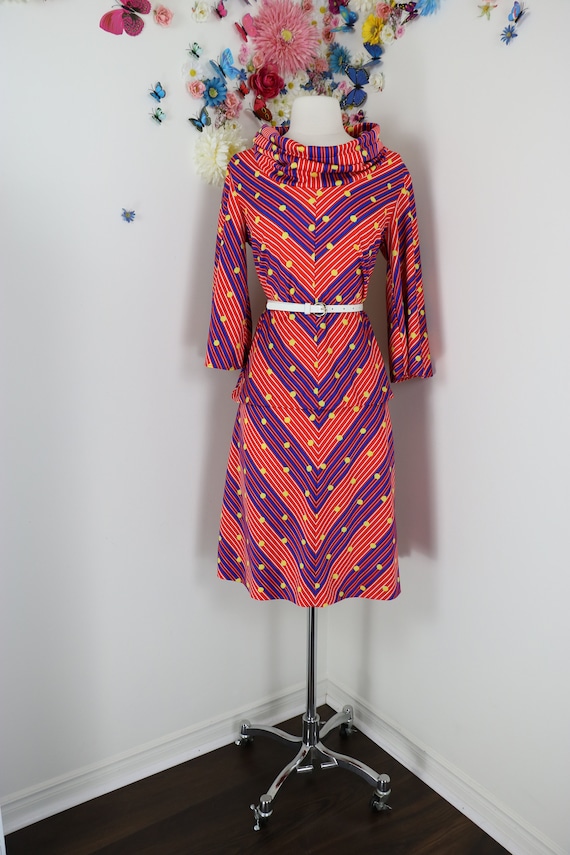 Vintage 1950s full swing dress with rainbow stripes in chevron style pattern dolman sleeve