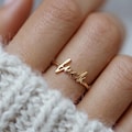 Dainty Gold 'Fuck' Ring - Middle Finger Jewelry product logo