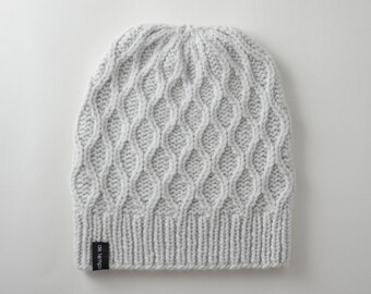 Hand knitted white scarf and hat