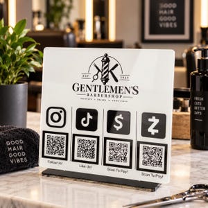 May include: A rectangular white acrylic sign featuring the black logo for Gentlemens Barbershop, including a barber pole, scissors, and razor. Below are four black social media and payment icons with corresponding QR codes and text labels.