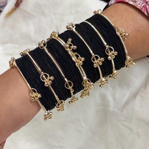 May include: A rustic wooden sign with the text "Welcome to our home" in white lettering. The sign features a distressed finish and a simple, inviting design, perfect for entryway decor.