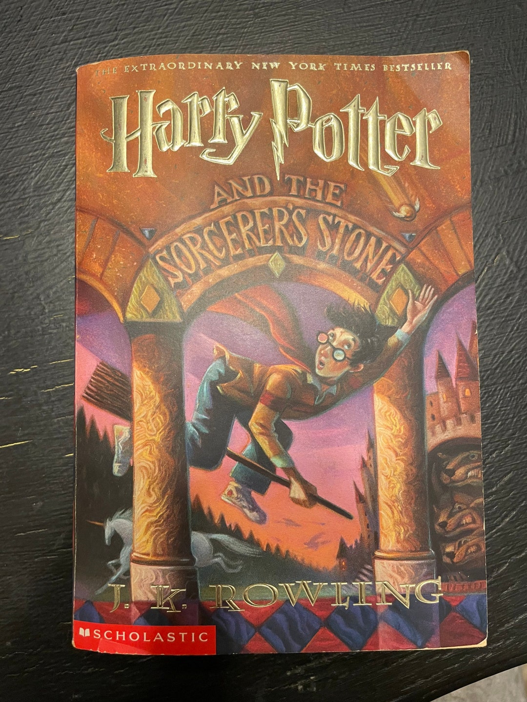 Buy Harry Potter and the Sorcerer's Stone by Scholastic With Free