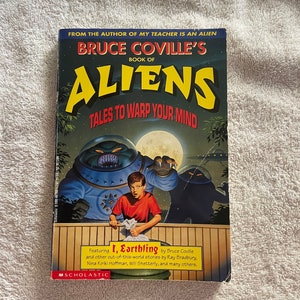 May include: A book cover with a blue and green alien on the front. The book title is "Bruce Coville's Book of Aliens: Tales to Warp Your Mind".